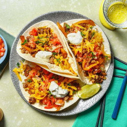 Chorizo and Sweet Pepper Tacos with Lime Crema and Salsa Fresca