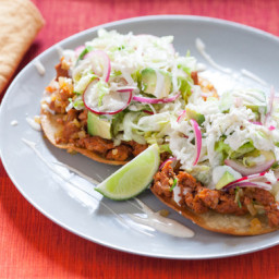 Chorizo Tostadas with Pickled Red Onions, Lime Crema & Queso Fresco 