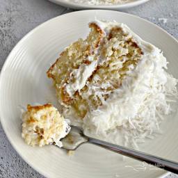 coconut-cream-poke-cake-with-coconut-whipped-cream-frosting-2661913.jpg