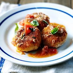 Crabcakes with a tomato, crab and basil dressing