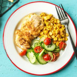 Crispy Chicken Thighs with a Cucumber Tomato Salad and Brown Butter Corn