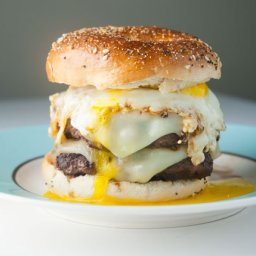 Double Swiss Cheeseburger with Fried Egg on Everything Bagel