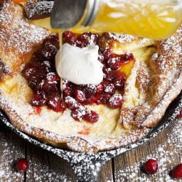 Dutch Baby with Caramelized Cranberries and Clementine Syrup