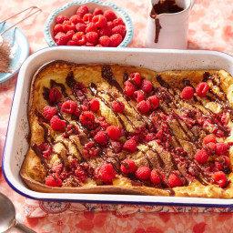 Giant Dutch Baby Pancake with Raspberries and Nutella Syrup