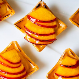 Goats' cheese tarts with roast peaches and vincotto