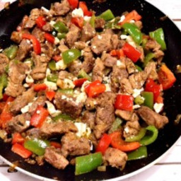 Greek-style Fried Pork Bites with Peppers and Feta Cheese