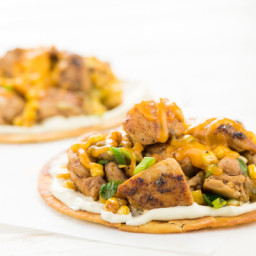 Green Chili Chicken Thigh Tostadaswith corn and cheddar cheese