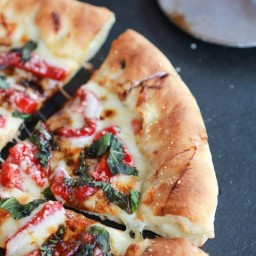 Green Olive Pesto Pizza with Roasted Red Peppers and Feta Stuffed Crust