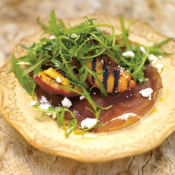 Grilled peach salad with bresaola and a creamy dressing