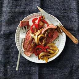 Grilled Rib Eye Steaks with Roasted Peppers & Onions