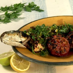 Grilled sea bass with herb and raisin salsa and chermoula marinade