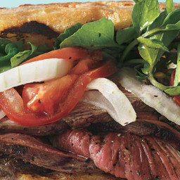 Grilled Steak Sandwiches with Marinated Watercress, Onion, and Tomato Salad