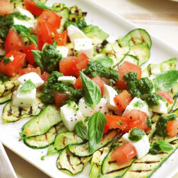 Grilled zucchini with caprese salad and rocket salsa