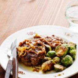 Hamburger patties with onions and Brussels sprouts