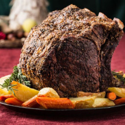 Herb-Crusted Beef Rib Roast with Potatoes, Carrots, and Pinot Noir Jus