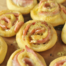Hot Ham and Cheese Roll-Ups with Dijon Butter Glaze