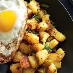 Indian spiced potatoes with fried egg