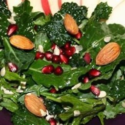 kale-salad-with-pomegranate-sunflower-seeds-and-sliced-almonds-1343281.jpg