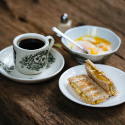 Kaya toast with half-cooked eggs and Hainanese coffee