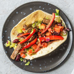Kiwi Salsa and Steak Fajitas with Charred Bell Pepper, Onion, and Blistered