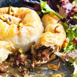 Lamb, cinnamon and date filo pies with honey pistachio dressing