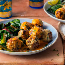 Mediterranean turkey meatballs with red pepper–cashew crema and wilted gree