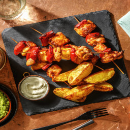 Mexican Chicken, Halloumi and Pepper Skewers with Wedges, Fresh Guacamole a