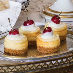 Miniature White Chocolate Cheesecakes with White Chocolate–Dipped Cherries