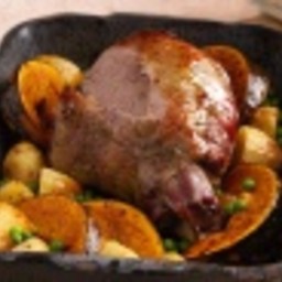 Minted leg of lamb with roasted vegetables