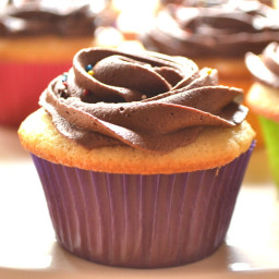 one-dozen-yellow-cupcakes-with-chocolate-buttercream-frosting-1909614.jpg