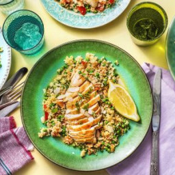 One-Pan Chicken and Couscous Pilaf with Peas, Almonds, and Spicy Crema