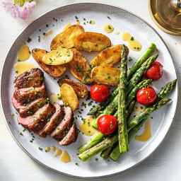 Pan-Seared Duck Breasts with Duck-Fried Potatoes, Asparagus, and Grape Toma