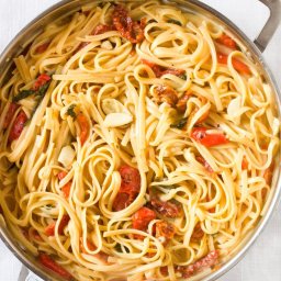 Pasta with Roasted Red Peppers, Sun-Dried Tomatoes,  and  Brie