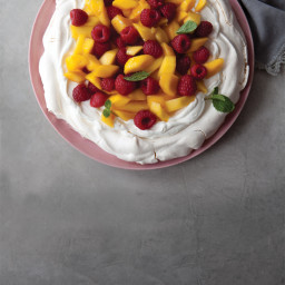 Pavlova with Mango, Raspberries, and Whipped Yogurt Cream