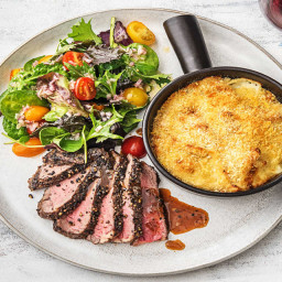 Peppercorn-Crusted Rib-Eye Steak with Truffle Mac ’n’ Cheese and Heirloom T