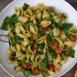 Pesto Pasta with Sausage Spinach and Jammy Tomatoes