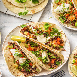 Pineapple Poblano Beef Tacos with Lime Crema, Cilantro, and Warm Spices