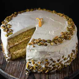 Pistachio layer cake with orange cream frosting
