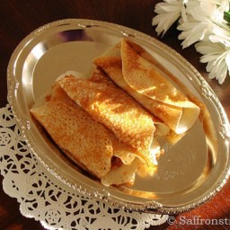 Pithe patishapta for Sankranti or rice crepes with coconut filling