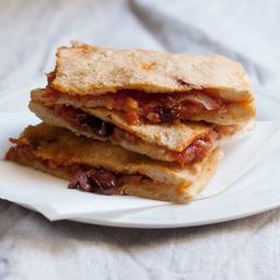 pizza-rustica-focaccia-filled-with-tomato-onions-and-olives-1294651.jpg