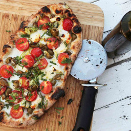 Pizza With Cherry Tomatoes, Halloumi, Olives, and Mint Recipe