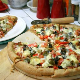 Pizza with Red & Green Peppers, Onions, Artichoke Hearts, and Olives