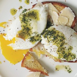 Poached Eggs and Parmesan Cheese Over Toasted Brioche with Pistou