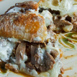 Pot Roast Sandwich Smothered in Gravy with Melted Swiss Cheese and Horserad