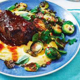 Pot-roasted lamb shanks with polenta and sprouts