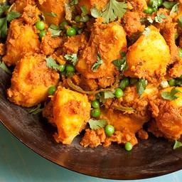 Potato and pea curry with tomato and coriander (aloo dum)