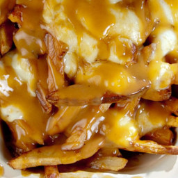 Poutine (French Fries with Gravy and Cheese Curds)