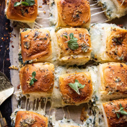 Pull Apart Garlic Butter Spinach and Artichoke Dip Sliders.