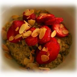 Quinoa Porridge with Sliced Strawberries and Chia Seeds