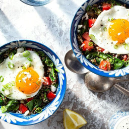 Quinoa-spinach grain bowls with feta, fried eggs, and fresh dill